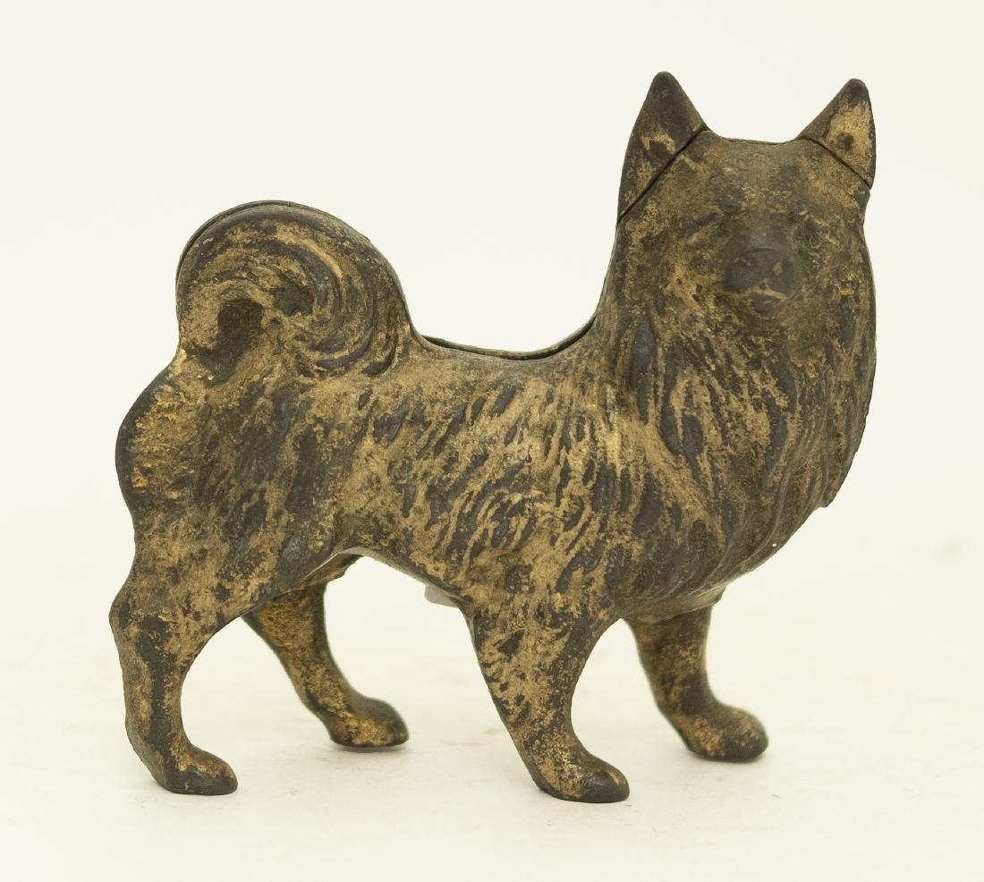 Grey Iron Spitz Cast Iron Still Bank: Made by Grey Iron Casting Co. of Mount Joy, Pennsylvania - Circa 1928. This is a scarce bank. Made of Cast Iron. 4 3/4" L. Very Good Condition.