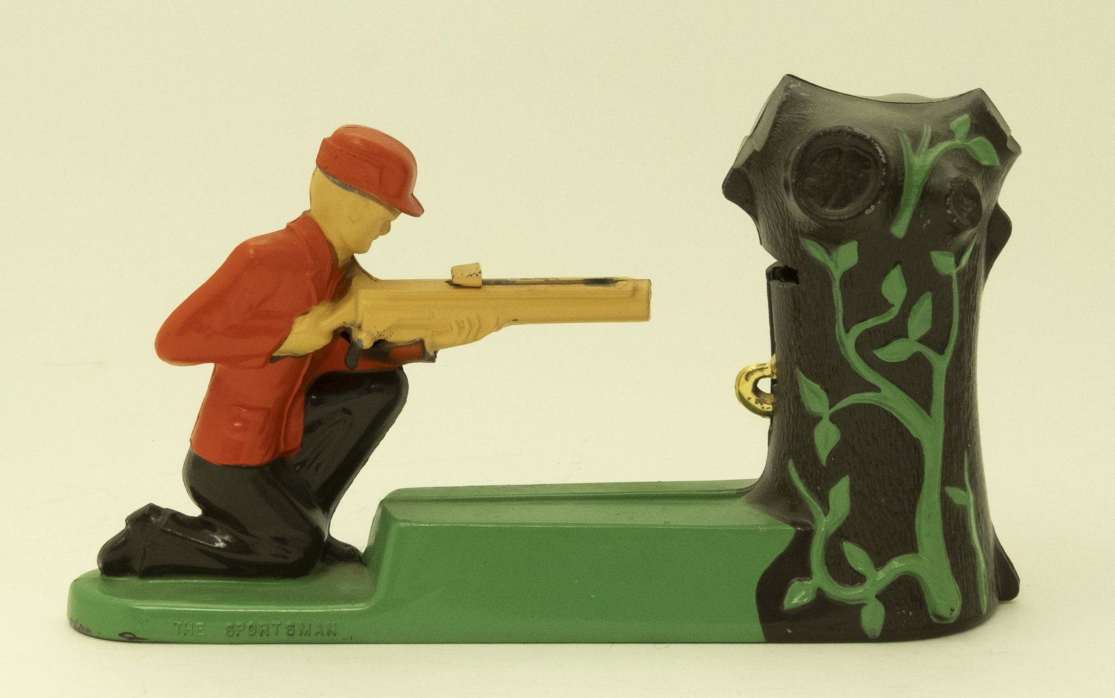 The Sportsman Mechanical Bank: Place the penny on the barrel of the rifle, pull the trigger and the Sportsman shoots the squirrel in the tree, depositing your coin. Made of Aluminum and Plastic Squirrel. Near Mint Condition (Some w