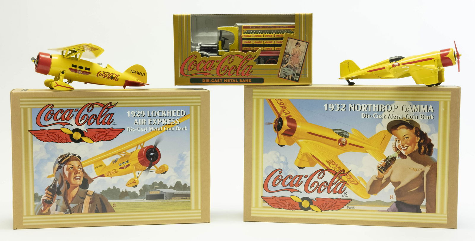 Three Boxed Coca Cola Banks (1 of 2)
