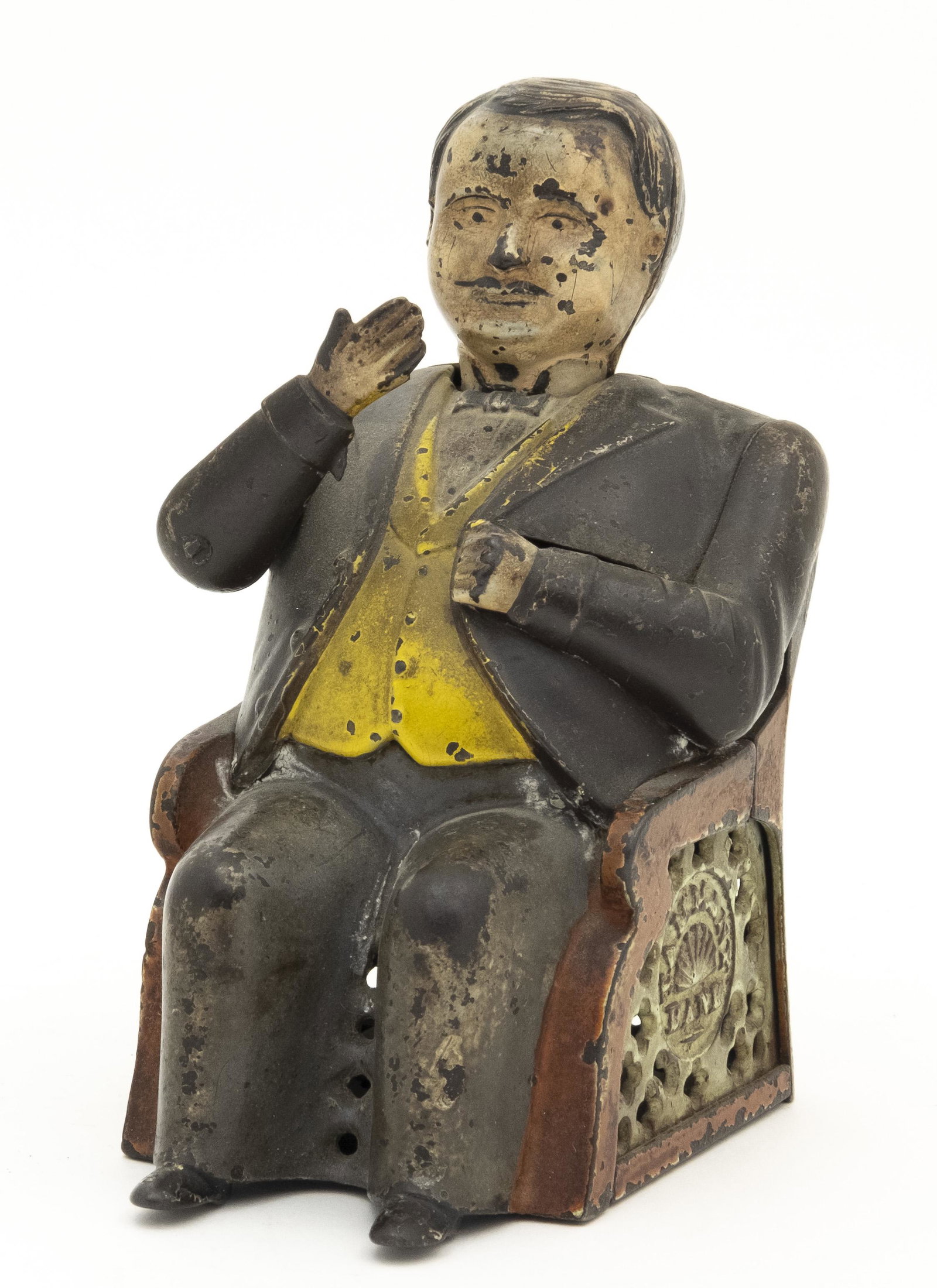 Tammany Cast Iron Mechanical Bank: J. & E. Stevens Company Cromwell, Connecticut - Circa 1880’s Place a coin in his hand and its weight causes the hand to lower and deposit the coin into his pocket. His nod signifies that he has acce