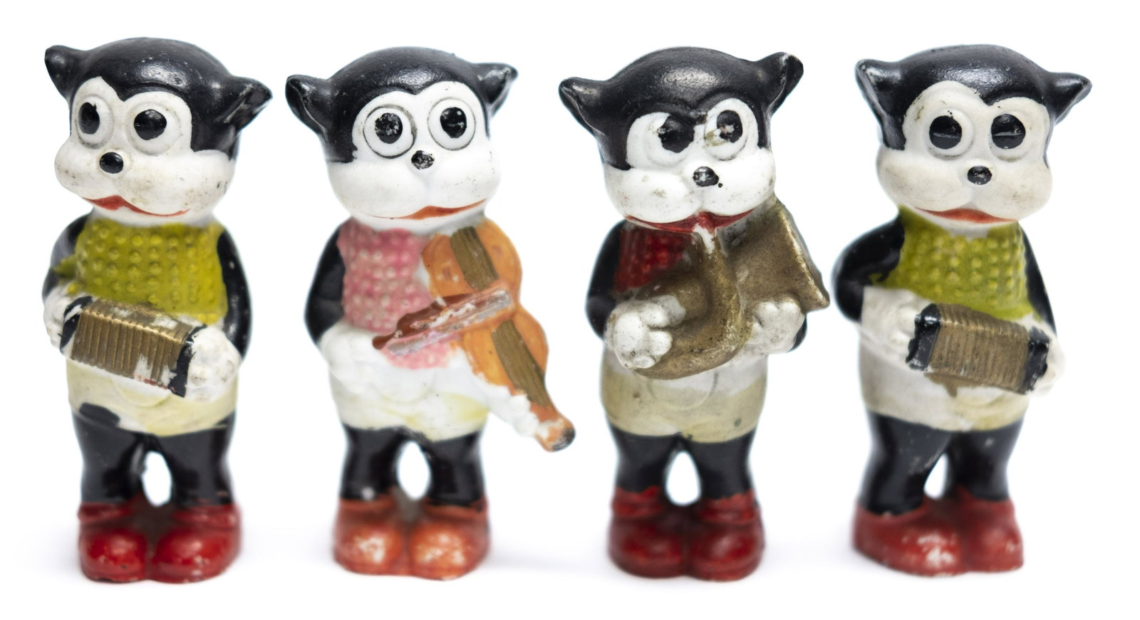 Four Bisque Bimbos: Japanese circa 1930's. Made of Bisque. 3 3/4" T. Fine to Very Fine Condition.
