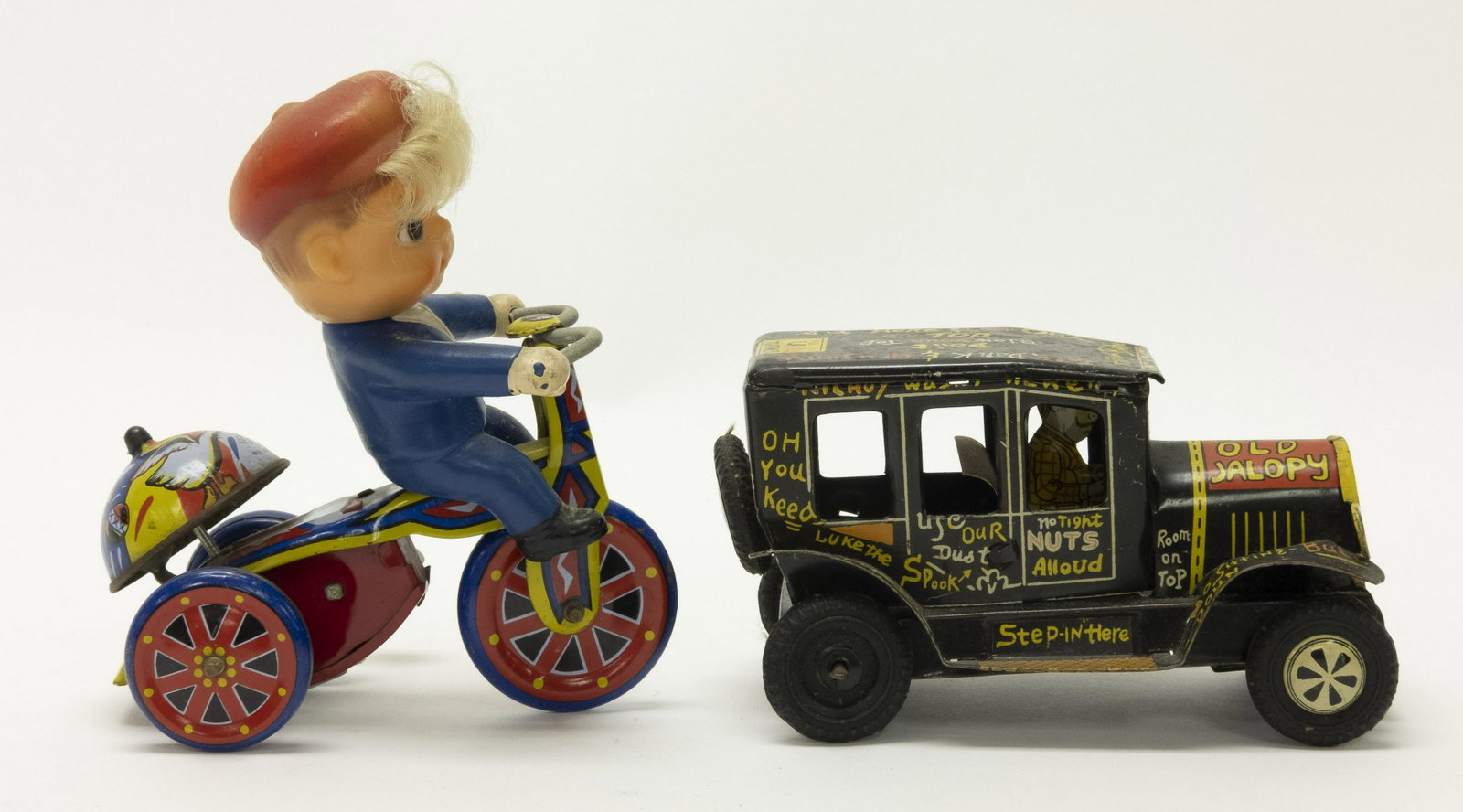 Marx Old Jalopy & Boy on Tricycle Toys: Old Jalopy Made by Marx. Boy on Tricycle made in Korea. 4 1/4" - 5" L. The Old Jalopy is Friction driven. Both toys worked when tested. Very Fine to Excellent Condition.