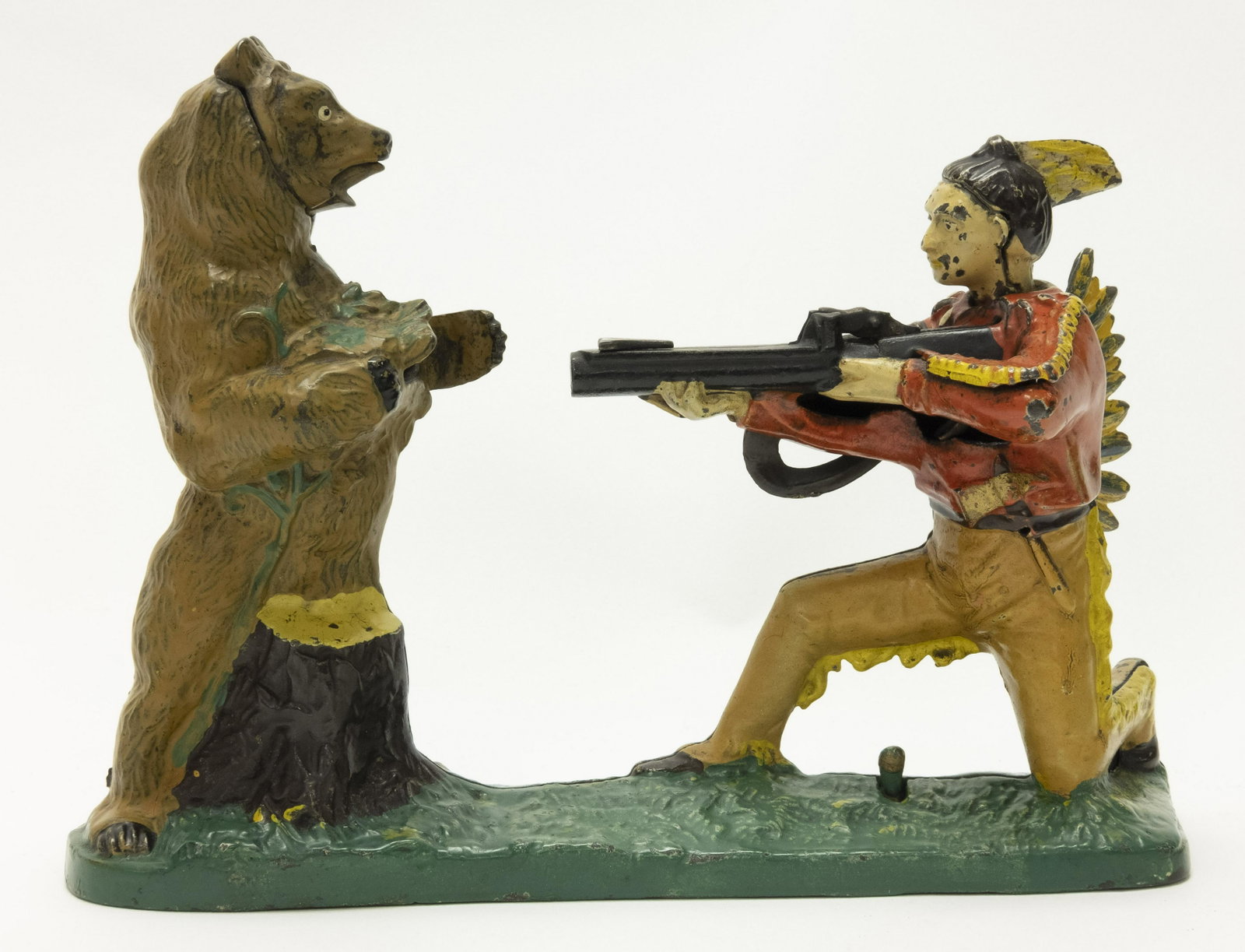 Indian and Bear Cast Iron Mechanical Bank: Made by J. & E. Stevens Company Cromwell, Connecticut - Circa 1885. Cock the rifle and place a coin flat on the barrel. Then, pull the lever towards you and the Indian shoots the bear in the chest wit