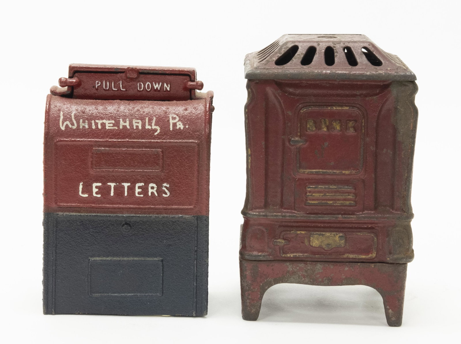 Mail Box & Heatrola Cast Iron Banks: Includes: Mail Box, American circa 1930's and Heatrola by Kenton Hardware. Made of Cast Iron. One Excellent, One Very Good Condition.