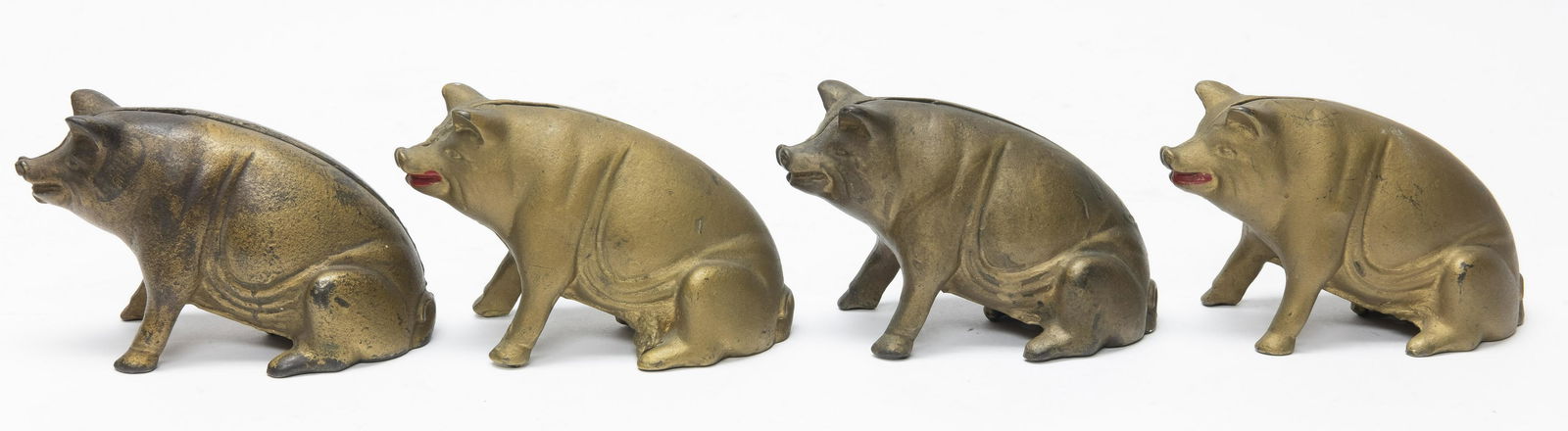 Four Seated Pig Cast Iron Still Banks (1 of 4)