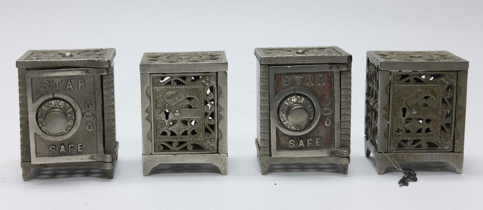 Four Cast Iron Safe Banks (1 of 4)