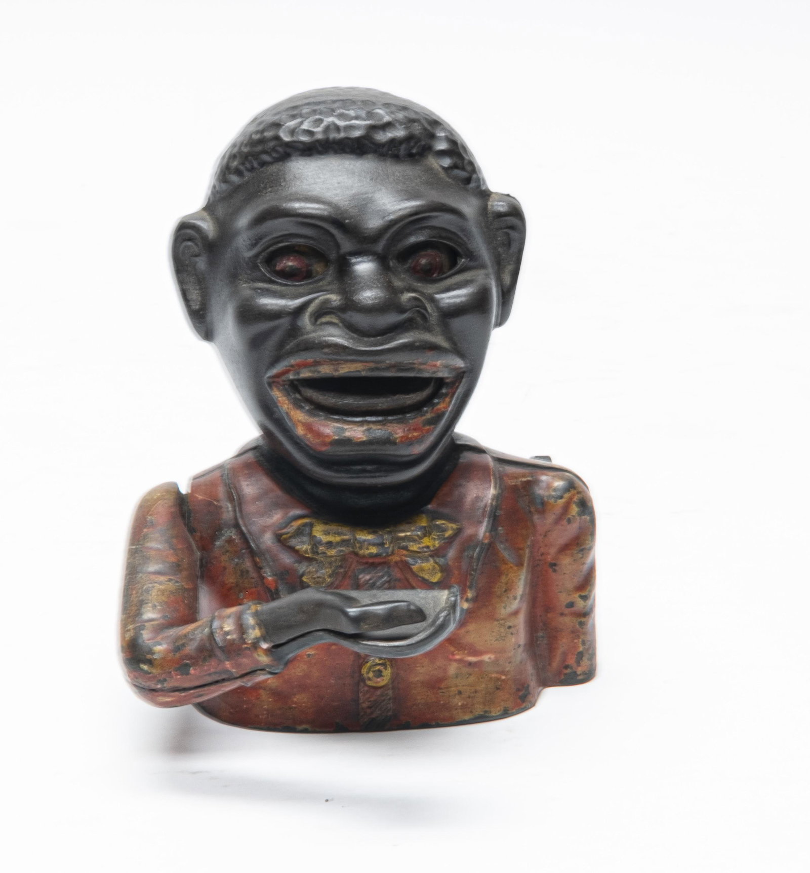 English Jolly N. Iron Mechanical Bank: Made in England. Made of Cast Iron. Good Condition. Some Fading to Red.