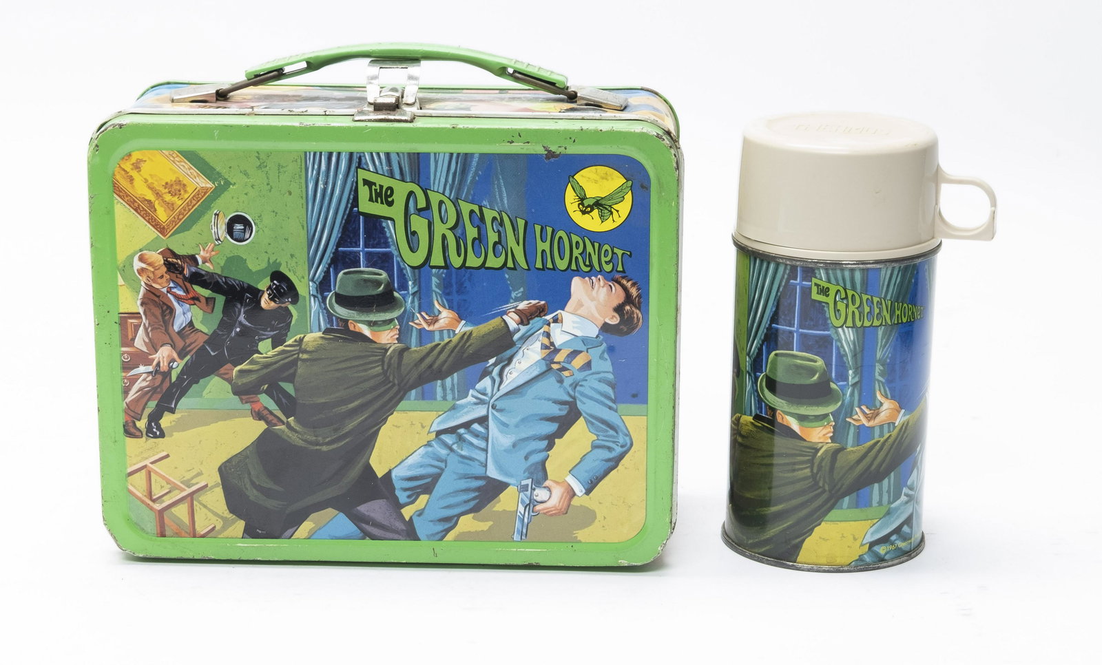 The Green Hornet Lunch Box: Made by King-Seeley Thermos Co. In Very Fine Condition. Includes original thermos. "As used" scratches.
