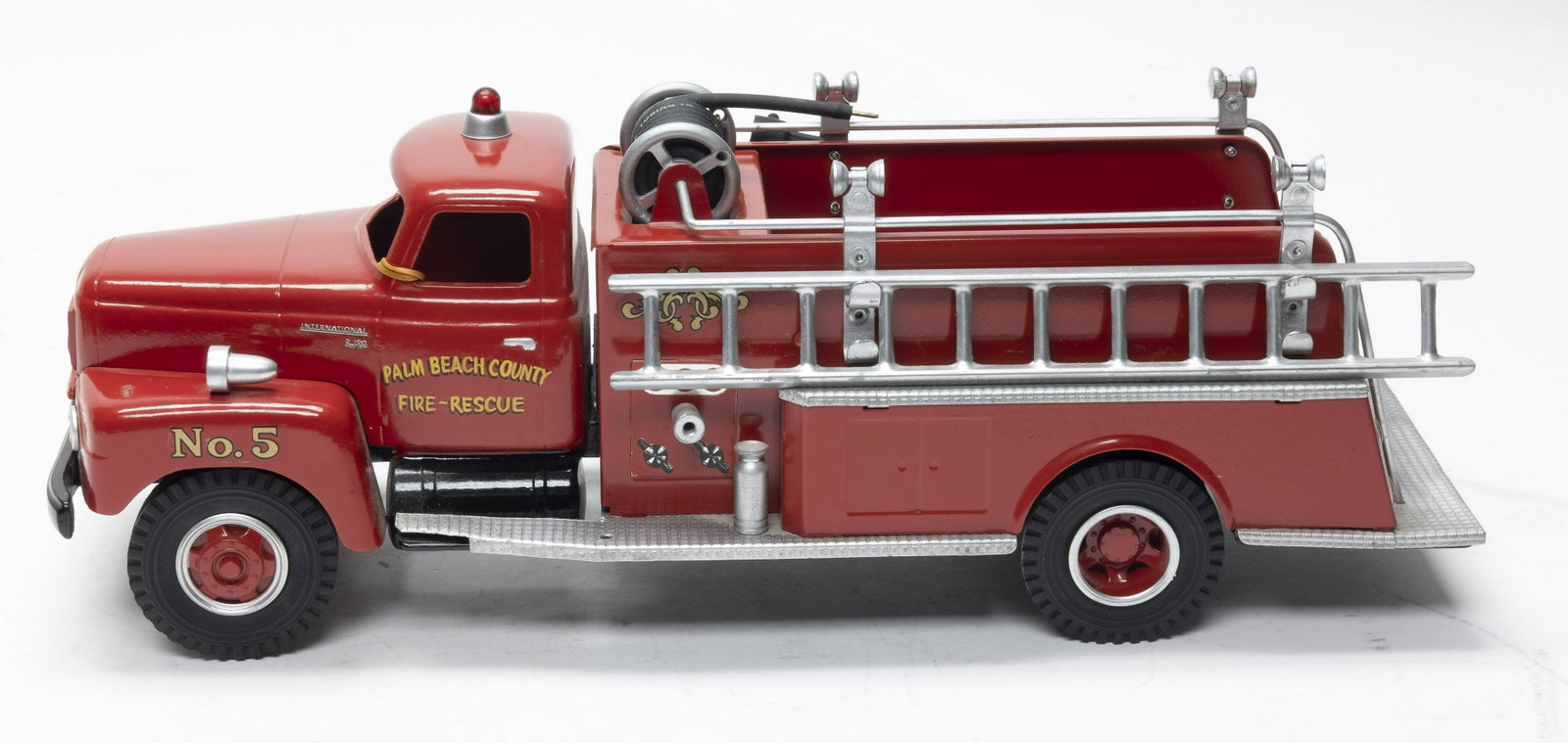 Tonka #5 "Palm Beach County Fire-Rescue": This is a modified Tonka toy. It looks wonderful. 17" Long. Made of Pressed Steel. Pristine Condition.