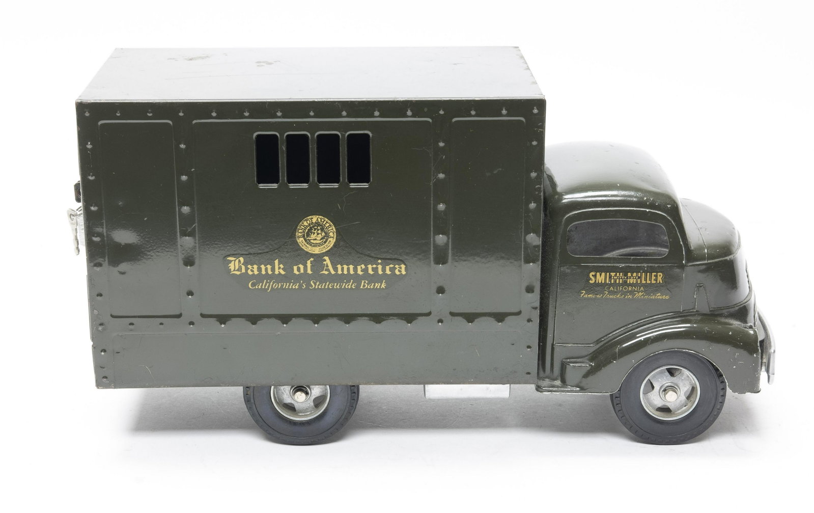 Smith Miller Bank of America Armored Car: Made by Smitty Toys. Made of Pressed Steel. 14" Long. Excellent Condition. **Due to large lot size shipping cost to be determined.