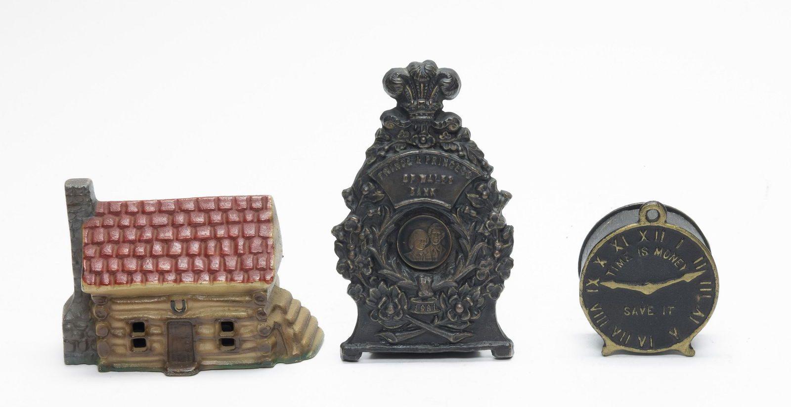 Three Modern Cast Iron Still Banks (1 of 4)