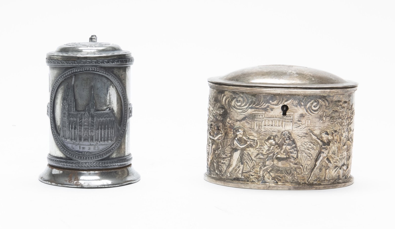 Two Silvered Tin Banks: Made in Germany. Made of Silvered Tin. Fine to Very Fine Condition.