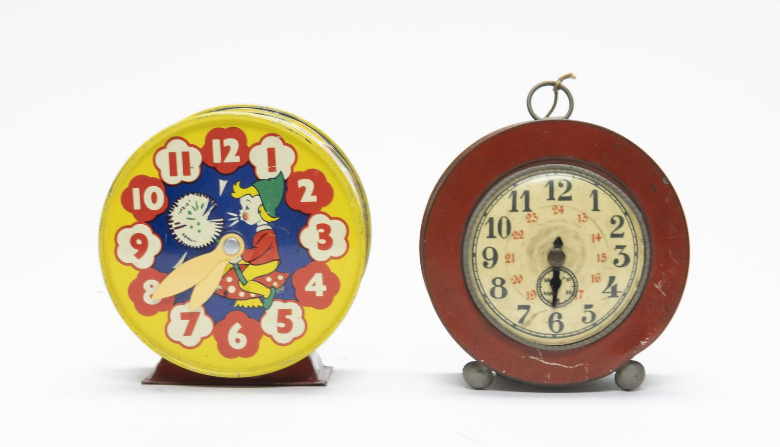 Two Clock Tin Still Banks (1 of 4)