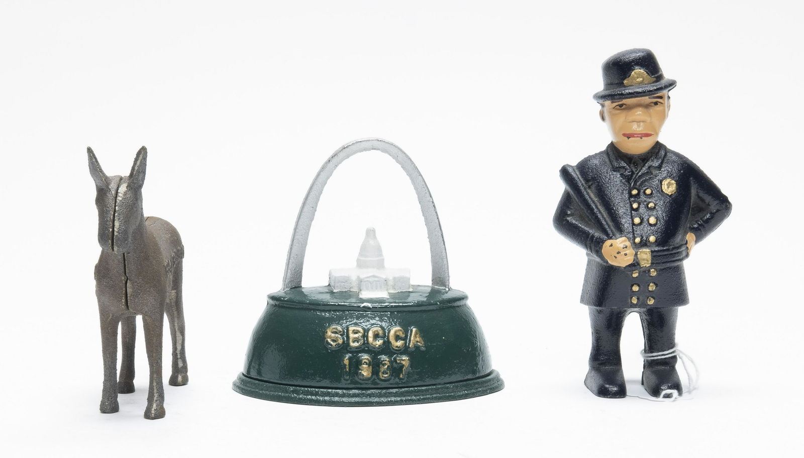 Three SBCCA Cast Iron Still Banks (1 of 4)