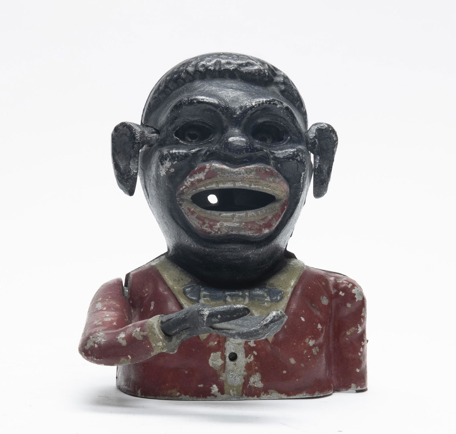 Starkies Jolly N. with Wiggly Ears Bank: Made by Starkies. Made of Aluminum. This version with Moving eyes and wiggly ears. Fine Condition.