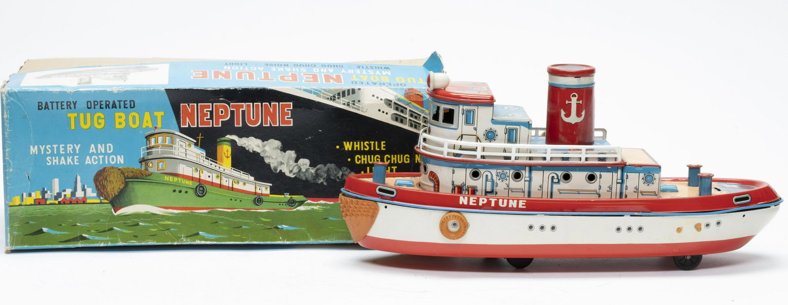Boxed Battery Op "Neptune" Tug Boat: Made in Japan. Made of Tin. 15" Long. Does not work. Excellent with Original Box. Box with damage.