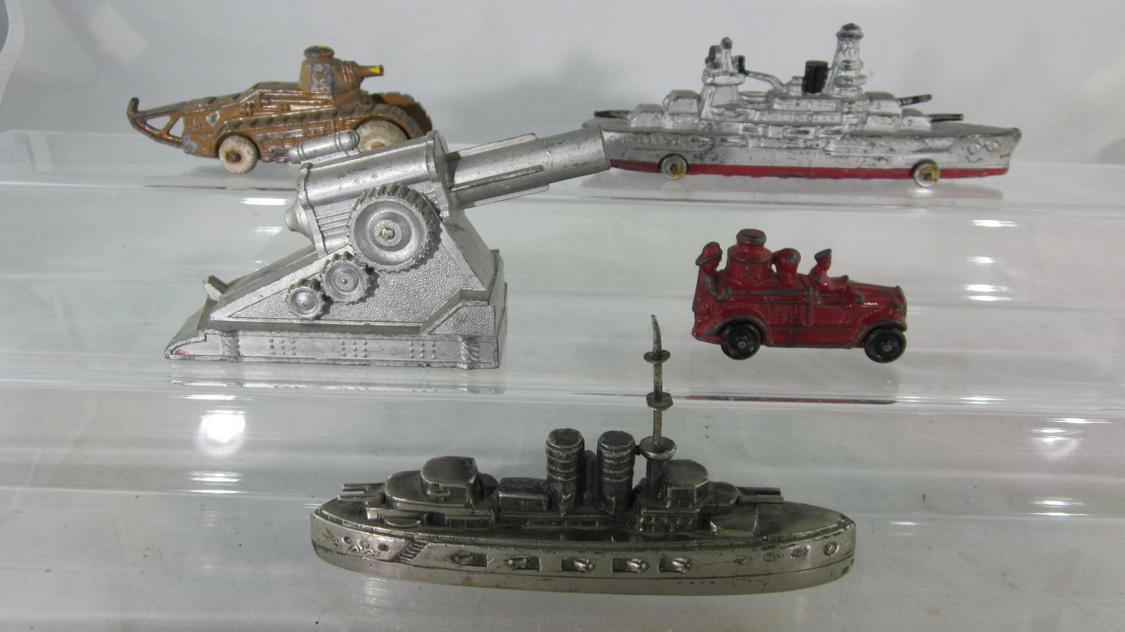 Japanese Mystery Ship & Dimestore Equipment.: Chrome-plated Japanese Battleship with 7 Japanese letters imprinted on bottom. 5" long, condition very good, along with Barclay Dimestore BV56 Renault Tank circa 1937, 4" long, B73 Battleship, 6" long