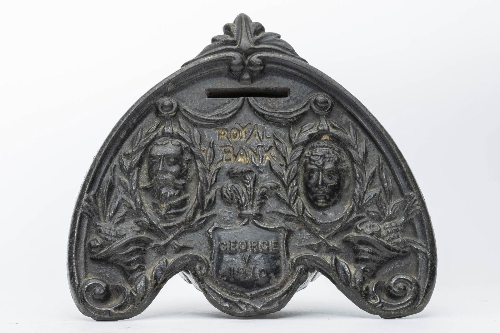 Royal Cast Iron Still Bank: Made by Chamberlain & Hill of England circa 1911. Made of Cast Iron. 5 1/4" T x 5 1/2" W. Fine Condition.