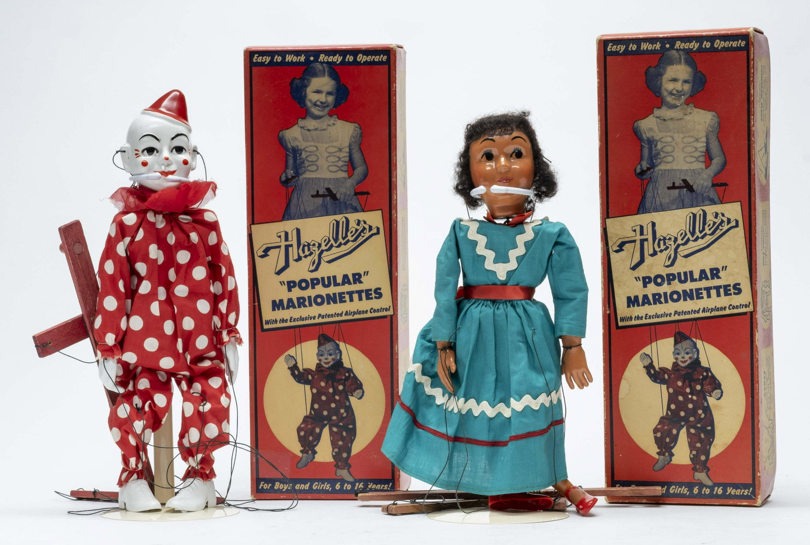 Hayzelle's Teto & Indian Girl Marionettes: Made by Hayzelle's. Includes 801 Teto, the Clown and 816 Indian Girl. Excellent to Pristine Condition with Original Boxes. 816 Box with some staining.