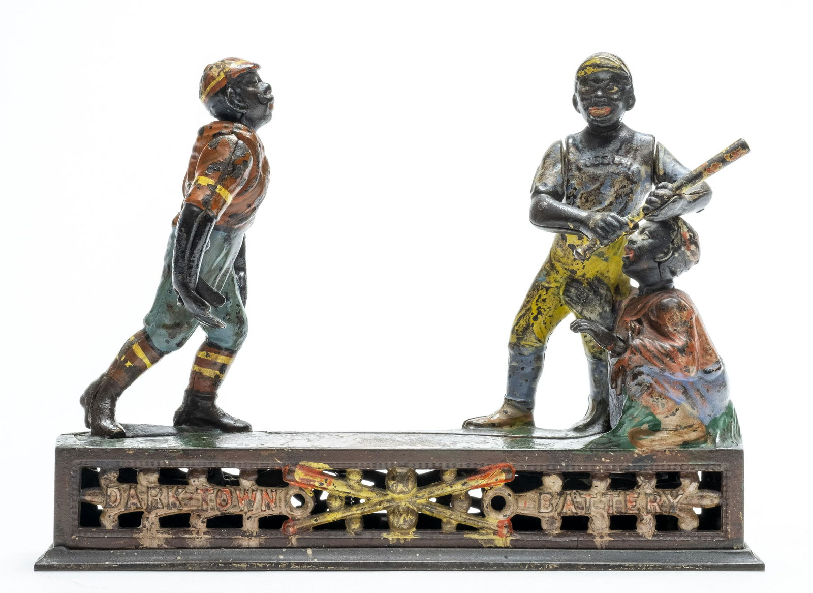 Darktown Battery Iron Mechanical Bank: J. & E. Stevens 1880's of Cromwell, Connecticut. Place a coin in the pitcher’s hand and press the lever. He pitches the coin and the batter swings, but the coin sails so quickly by him that it defle