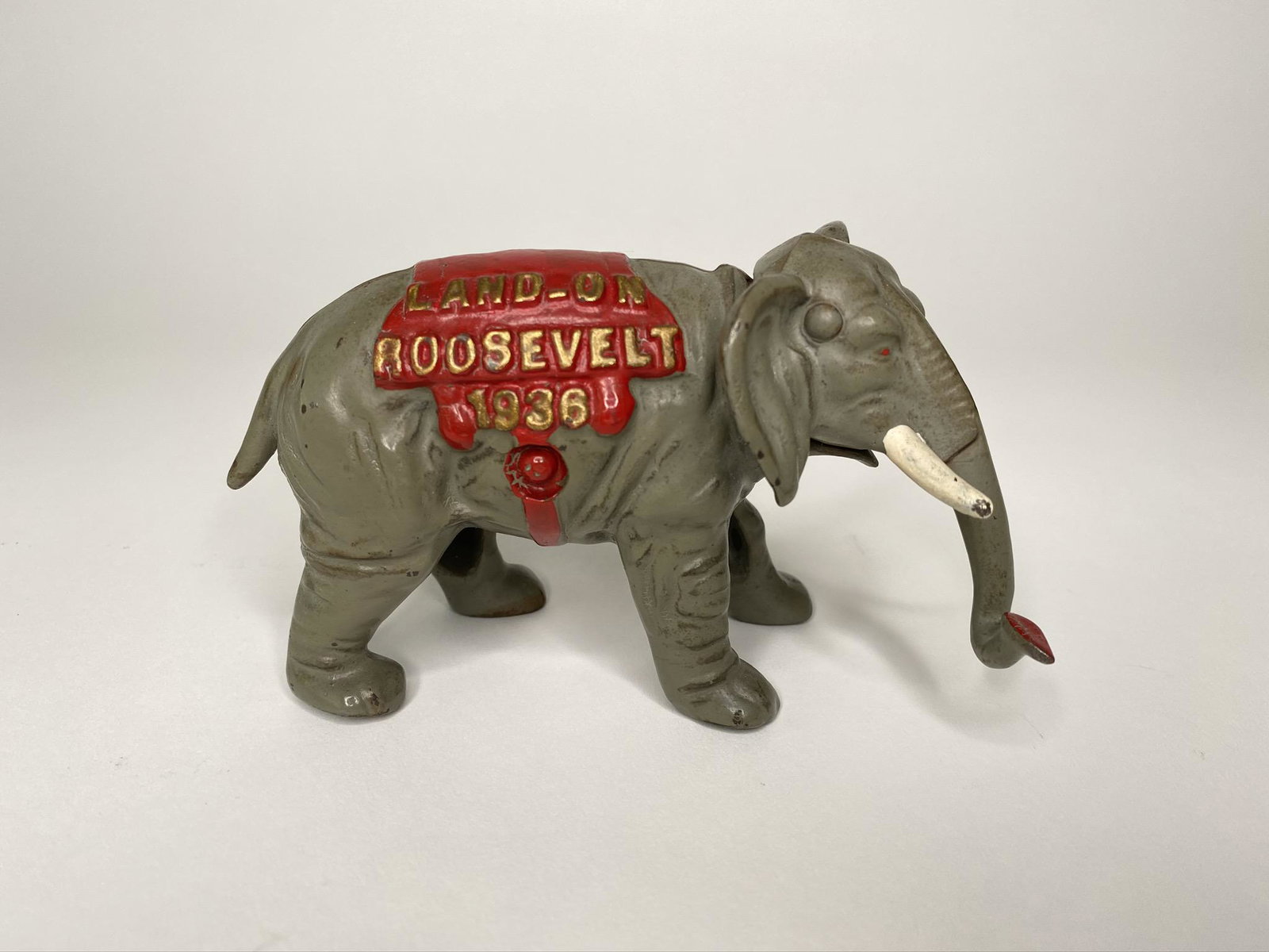 Land-on Roosevelt 1936 Political Elephant: Kenton Hardware. Ohio. Circa 1936. Beautifully sculpted and finished cast iron souvenir elephant to commemorate Franklin D. Roosevelt's Presidential Campaign of 1936. 5 inches. Cast Iron. Pristine Con