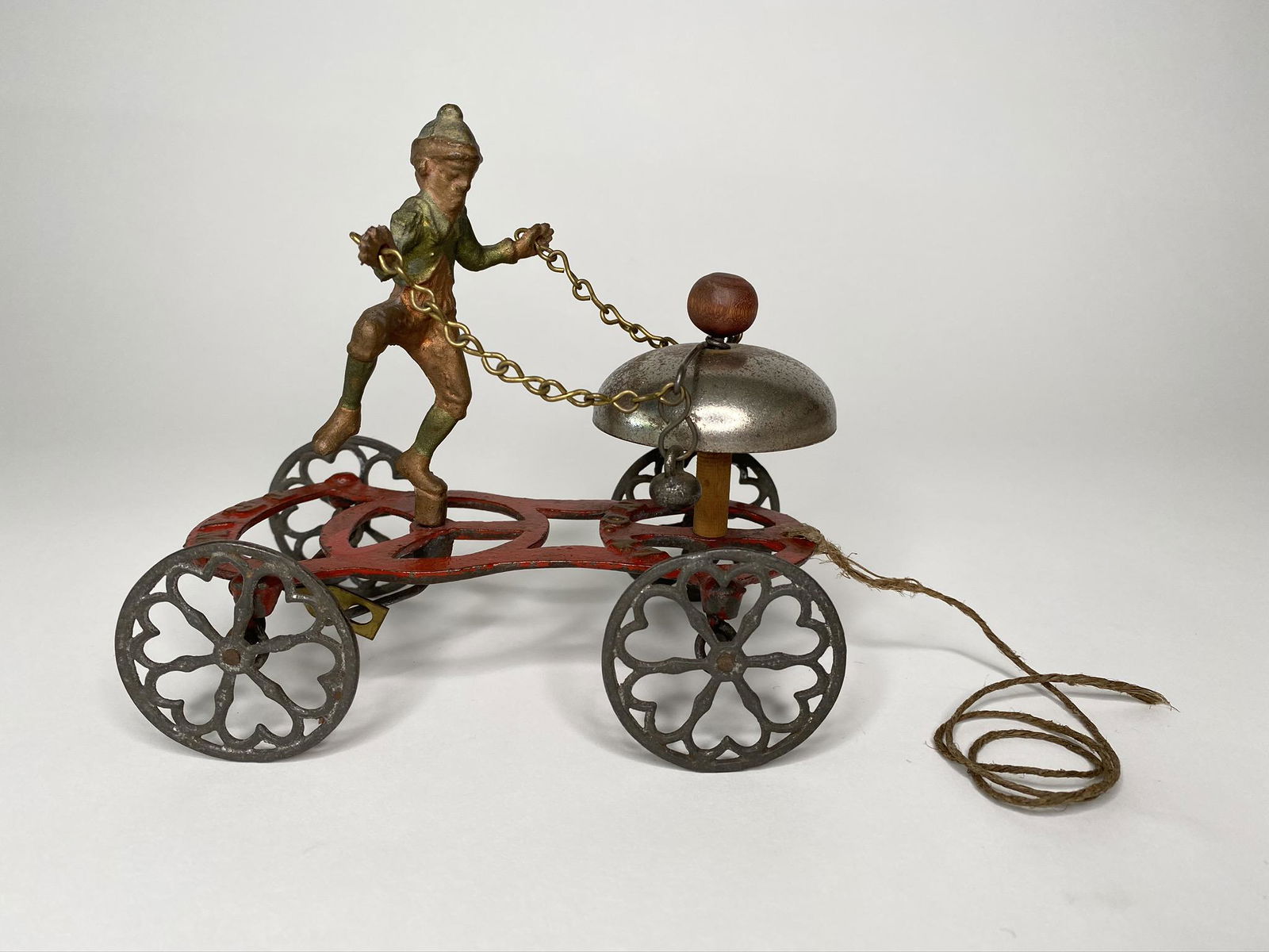 Tramp #47 Bell Toy: Gongbell Manufacturing Company. Connecticut. Circa 1890. 6 inches long. Cast Iron. Pristine Condition.