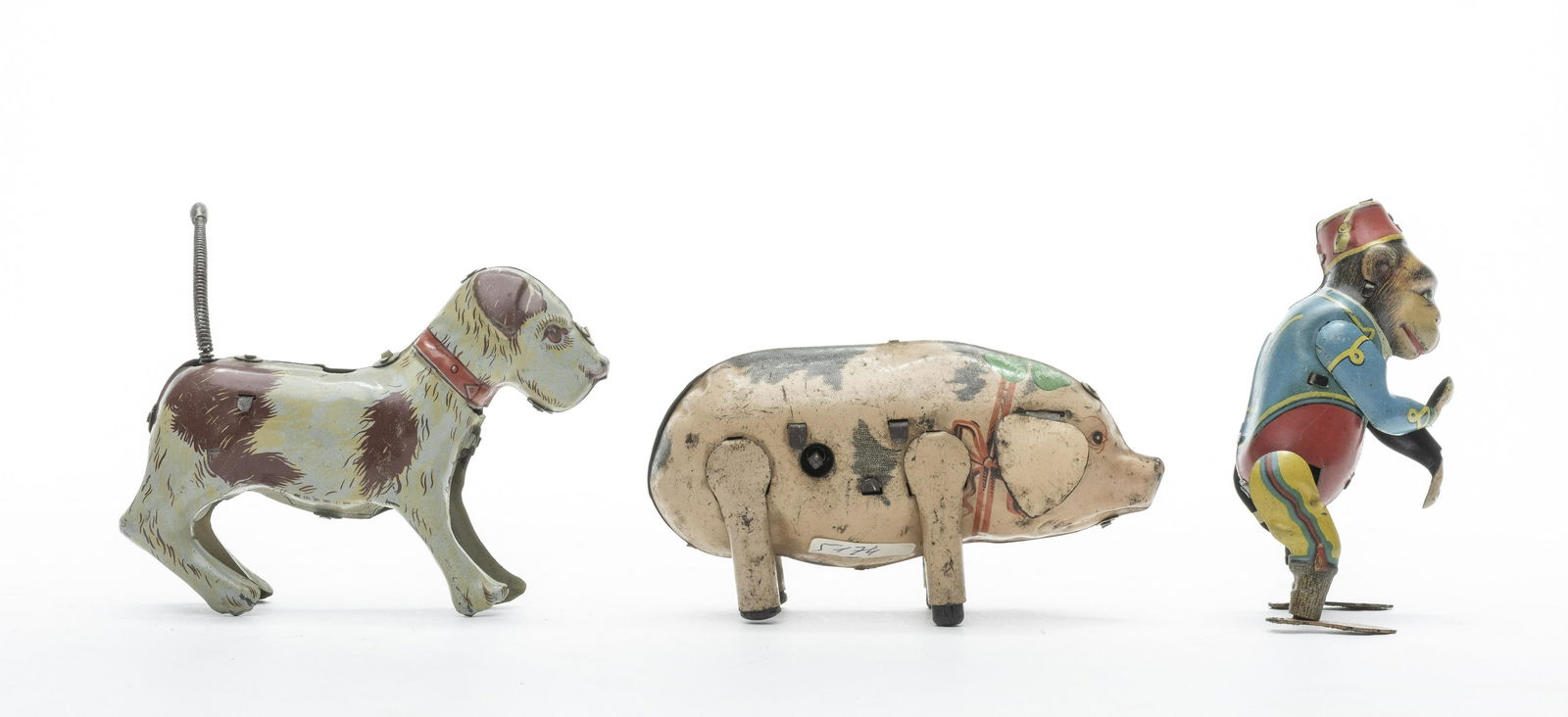Three Wind Up Tin Toys (1 of 4)