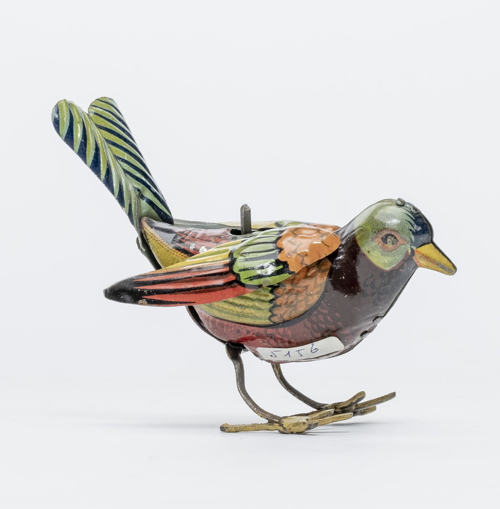Rocking Sparrow Tin Windup Toy: German - 1930's. Made of Tin. 3 1/2" Long. Currently not working. Excellent Condition. No Key.