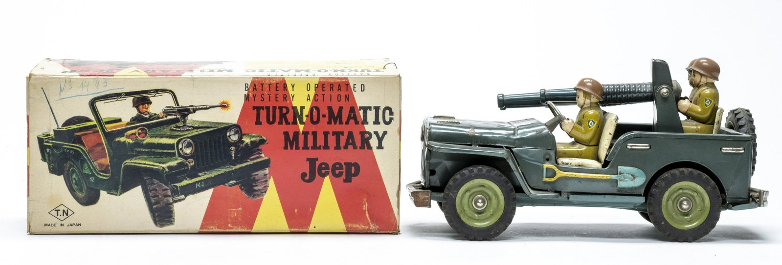 Friction Jeep w/ Anti Aircraft Guns: T.N Japan 1960's. 11 1/2" Long. Worked when tested. Fine Condition. Needs a clean, body needs to be reattached to chassis. The box lid for another similar toy.