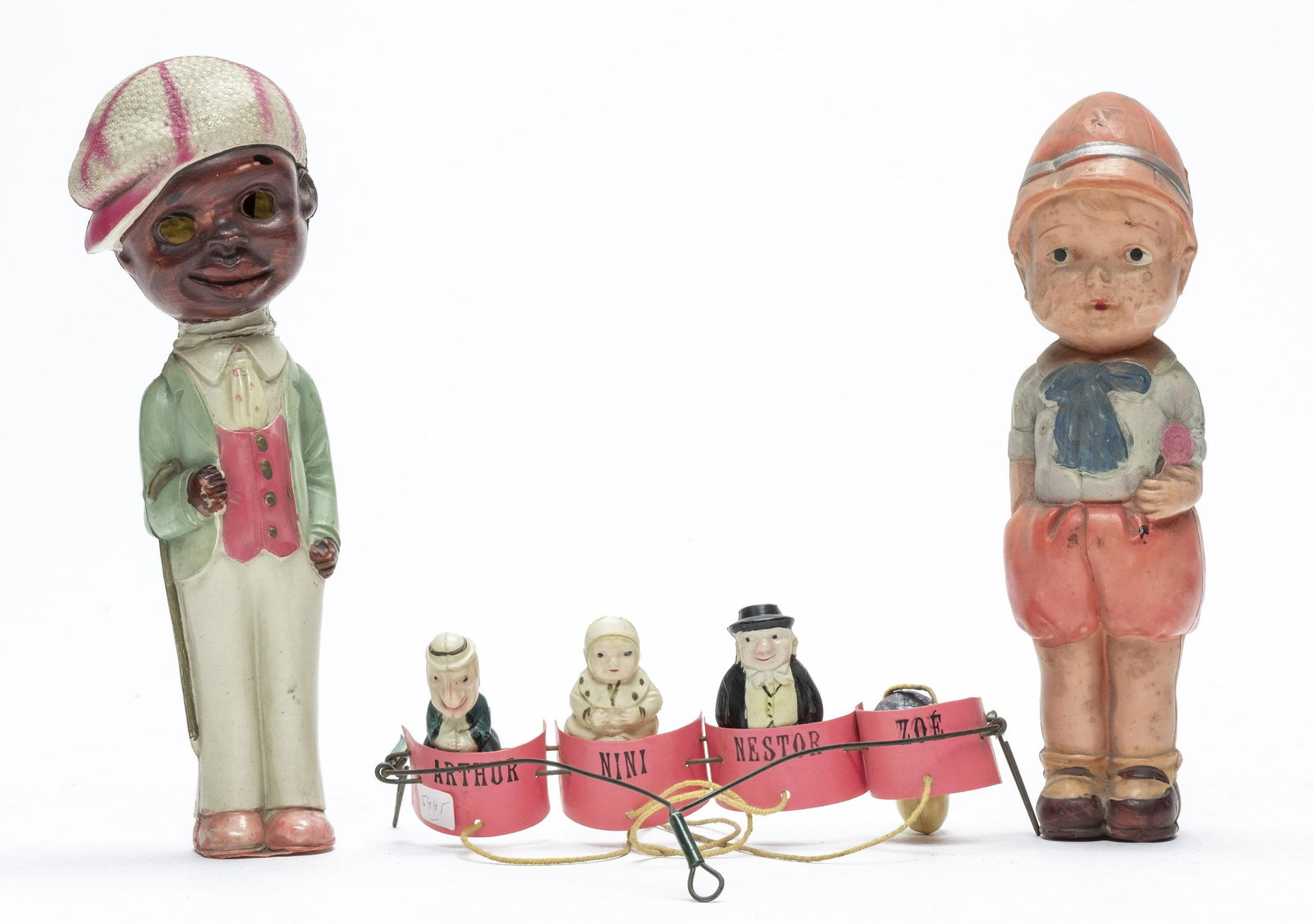 Two Figures and a Carnival Toy Celluloid (1 of 1)