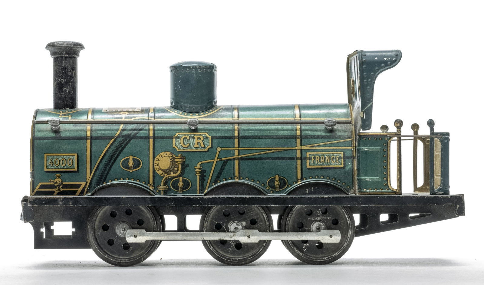Charles Rossignol Train Engine: Made by Charles Rossignol of France 1930's. 12 1/2" long. Missing the winding stem, but we believe it works. Fine Condition.
