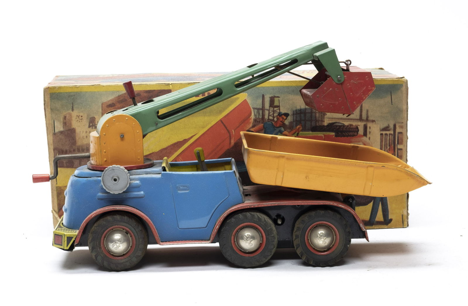 B & S Dump Truck with Shovel: Western Germany 1955 - 1960. 12" Long. This is a pull toy with a mechanism to lift the dump loader, the shovel can be used manually. Worked when tested. Excellent Plus Condition with Original Box Lid.