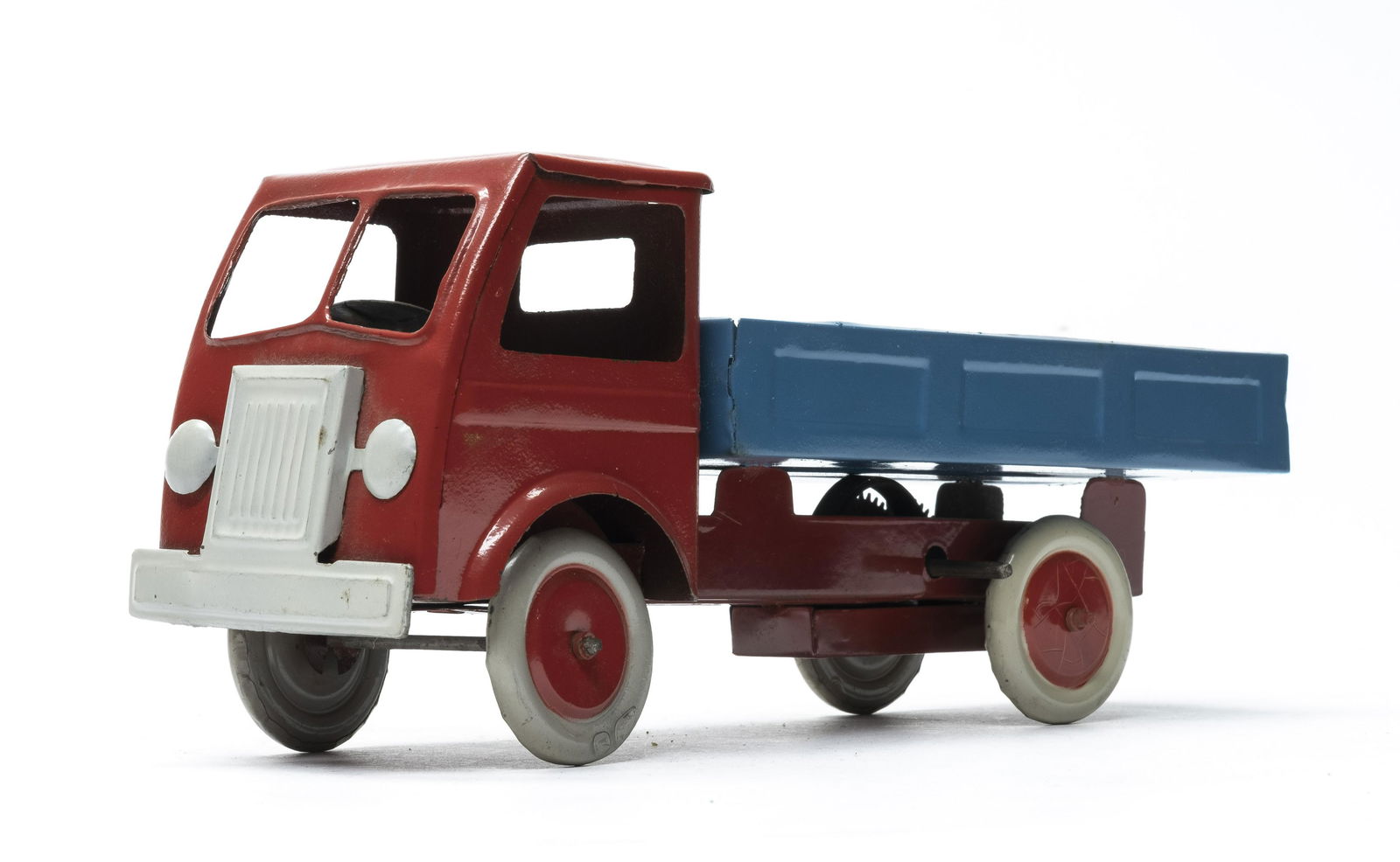 Colorful Dump Truck: Leonica. Italian 1950's. 10 1/2" Long. Made of Tin. Worked when tested. Wind up Action. Pristine Condition. No key.