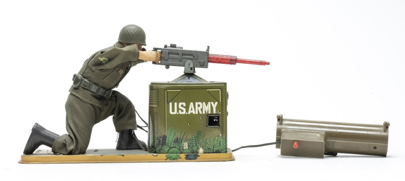 U. S. Army Machine Gunner: Tomy Toys of Japan late 1960's. 10" Long. Did not work when tested. Very Fine Condition.