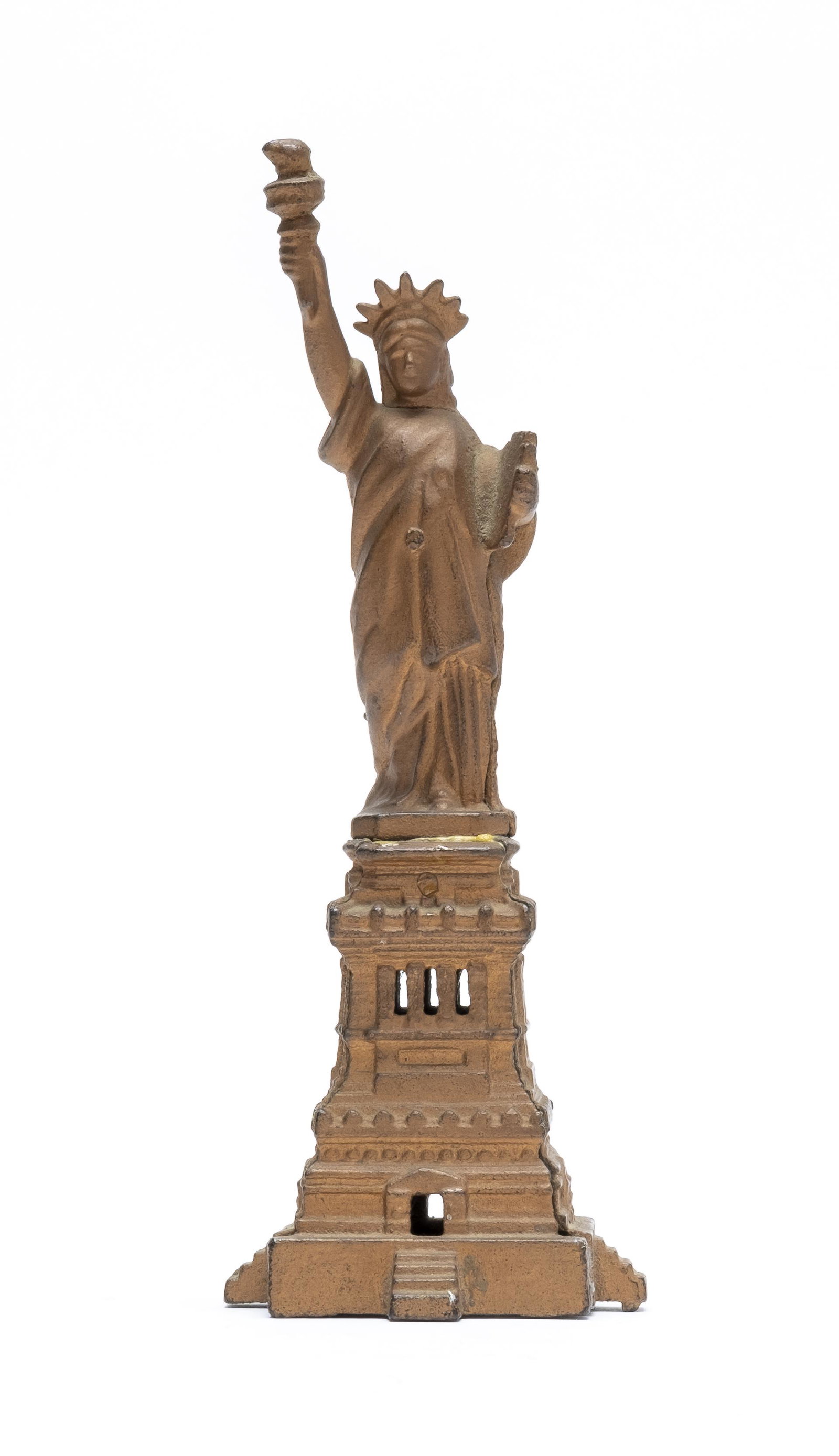 Statue of Liberty Iron Bank - Large: Kenton Hardware. Kenton, Ohio 1915. 9 1/4" Tall. The bank was repainted copper years ago and looks good. The figure has been glue repaired to the pedestal.