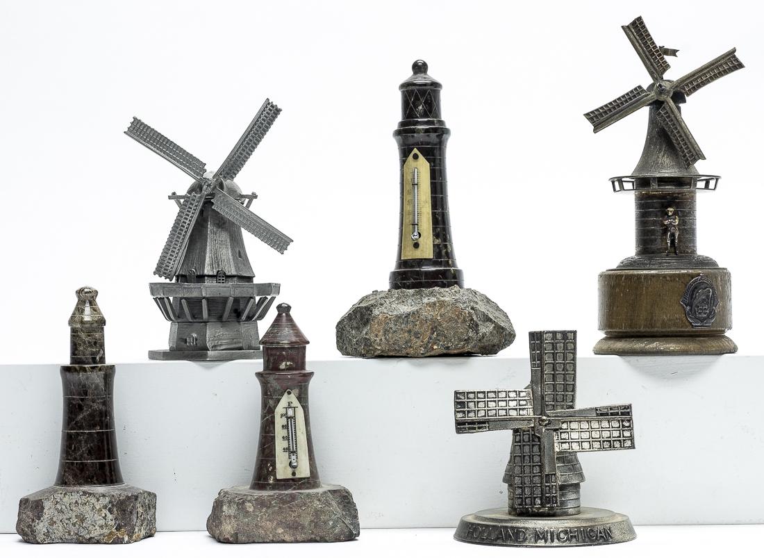 Three Windmills and Three Lighthouses: American/European - 1940's to 1980's - 3.25" to 6.75" Tall. The windmills for Holland, Michigan; Holland America Line Company and one other. Two of the lighthouses are thermometers. Very Fine or Bette
