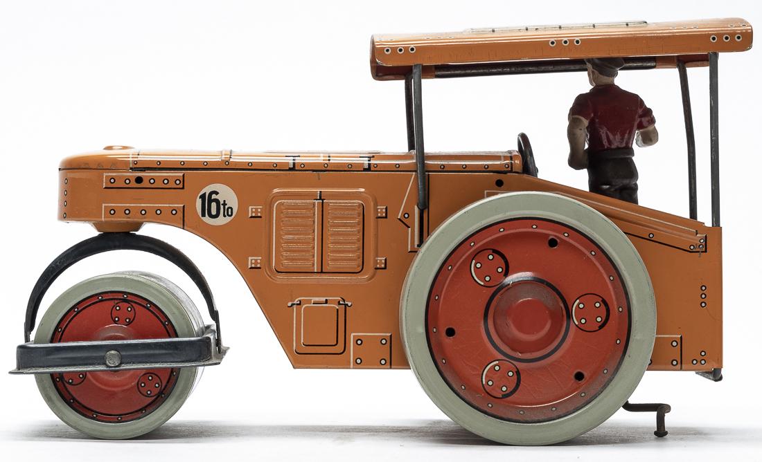 Tipp & Co. Road Roller: Tipp & Company. German - 1950 - 9.75" Long. The toy in pristine and bright condition. Worked when tested. Pristine Condition.