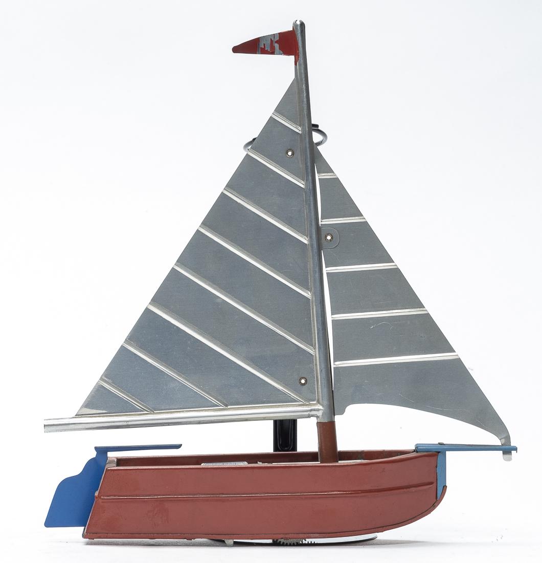 GESCHA Sailboat: Gescha. U. S. Zone Germany - 1950's - 8" Long x 8.5" Tall. This is a very colorful toy. Worked when tested. Excellent Plus Condition.