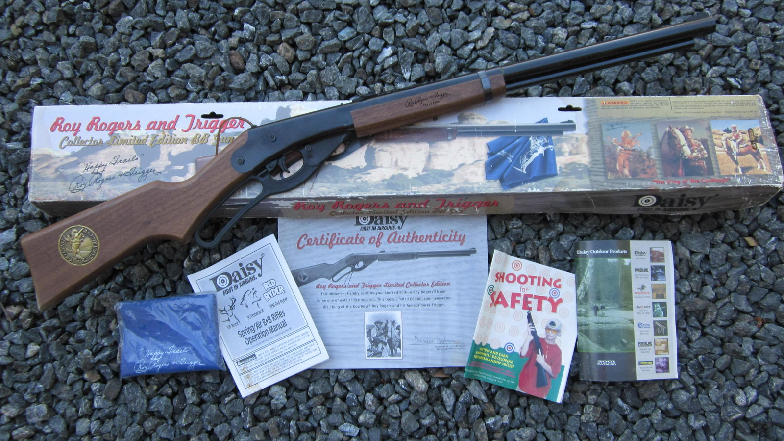 Daisy Roy Rogers Limited Edition BB Gun: Roy Rogers and Trigger Collector Edition BB Gun, #533 or 2500 issued, only offered in 2000. Walnut stock, gold color medallion in rifle stock. Condition Mint in very good box and includes Happy Trails