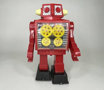 Red Gear Wind-Up Robot: Made by SH Japan. Circa 1970s. 8 1/2 inches tall. Excellent Condition.