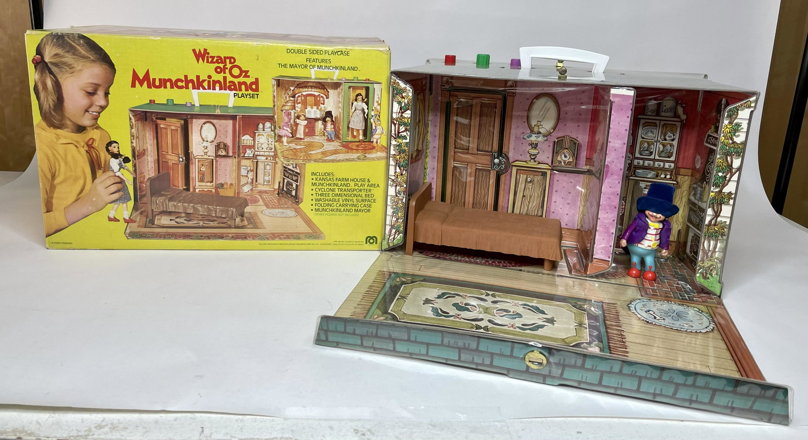 Wizard of Oz Munchkin Land: Made in Germany. With original box. Tin lithograph. Excellent Condition. Box Good with tears. **Additional Shipping Charge Due to Large Lot Size**