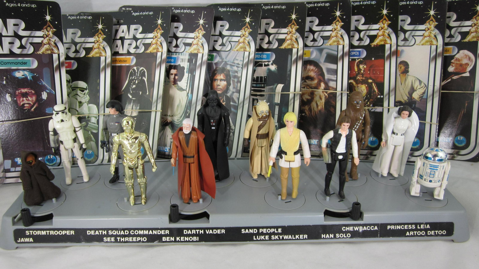 Star Wars Original 1978 Action Figures: UNBOXED the original Kenner Toy Company 12 Star Wars Action figures and Collector's Action Display Stand. All figures have been pulled from card and plastic packaging (all present) to mount on Display