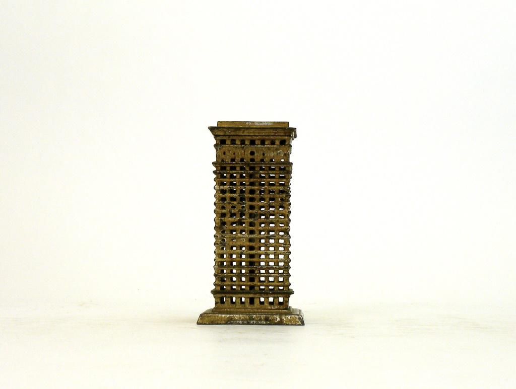 High Rise Building Iron Bank: Kenton Hardware. Kenton, Ohio - 1920's. 5.75" Tall. Very Fine Condition.