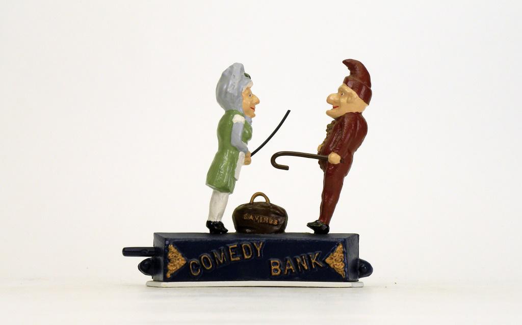 Comedy Bank: Reynolds Toys - 1980's. Place a coin in the money satchel and press the lever in causing Punch & Judy to appear to fight and depositing the coin. Mint Condition.
