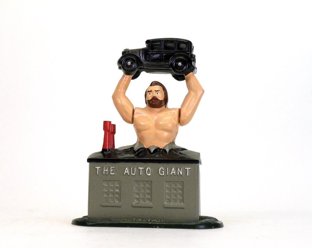 The Auto Giant Bank: Reynolds Toys - 1987. Made for the 30th Annual MBCA Convention held in Detroit and hosted by Dr. Greg Zemenick. Set the Auto in its locked position and place a coin halfway into the slot. Depress the 