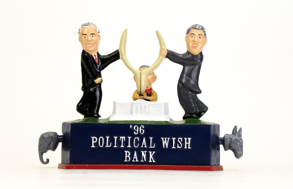 96 Political Wish Bank: Reynolds Toys - 1996. Made for the 1996 Presidential Race between Bill Clinton, Bob Dole and Ross Perot. Place a coin in the wishbone slot, press the Donkey head in for Bill Clinton and the Elephant h