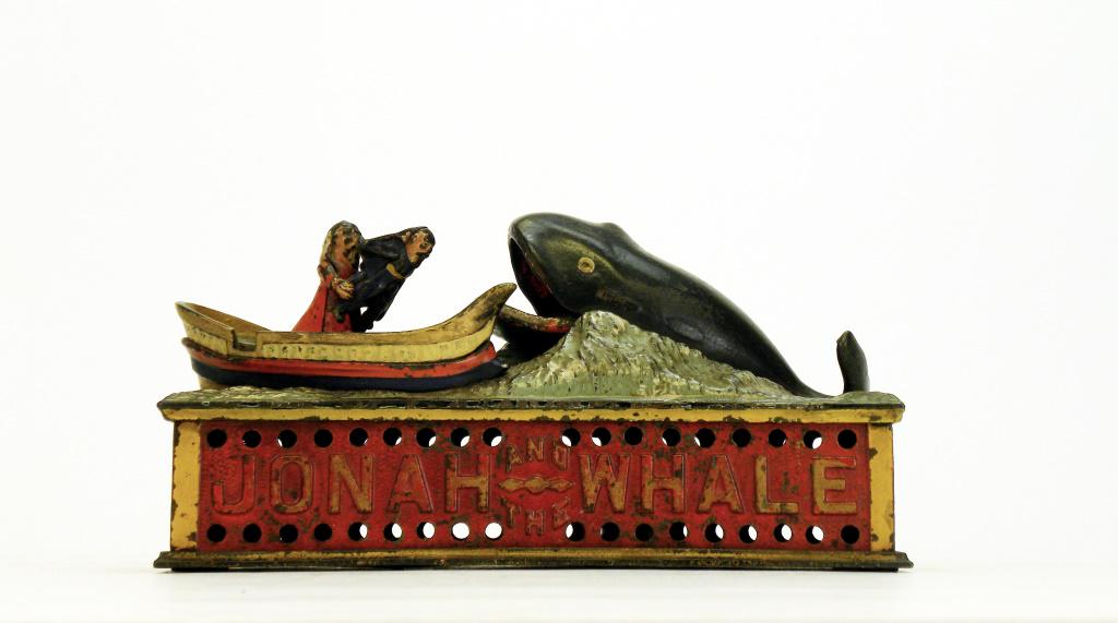 Jonah and the Whale Iron Bank: Shepard Hardware. Buffalo, New York - 1890's. The bank in fine overall, good working condition. The white paint on the top level of the boat is repainted.