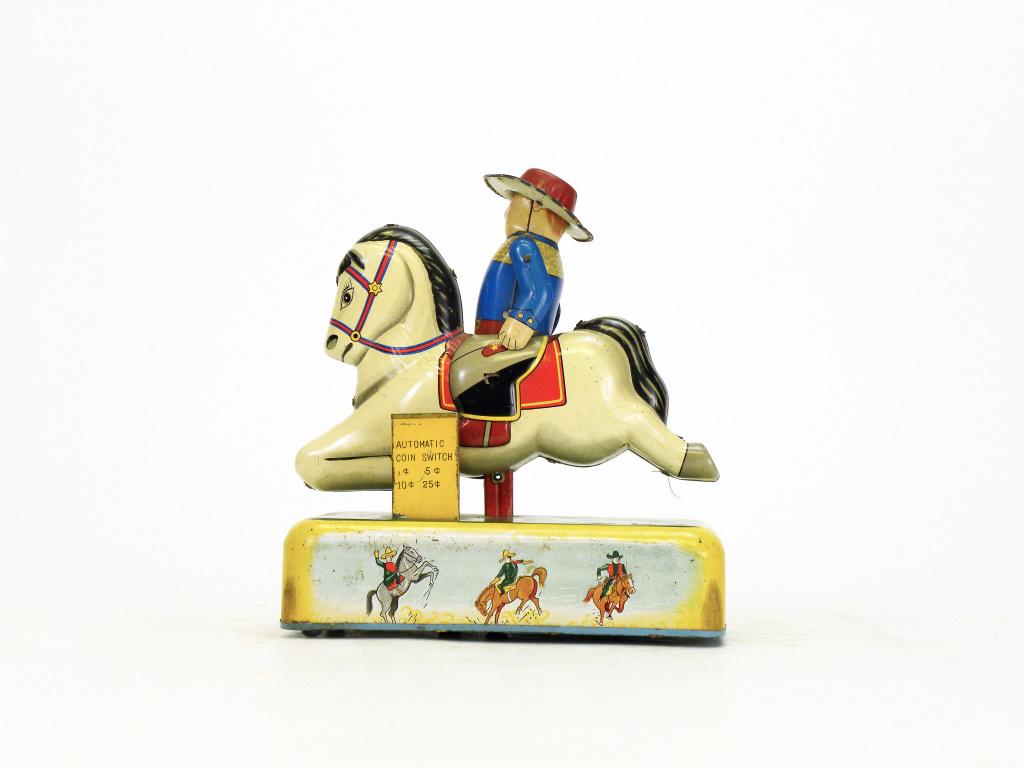 Cowboy on Horse Bank (1 of 7)