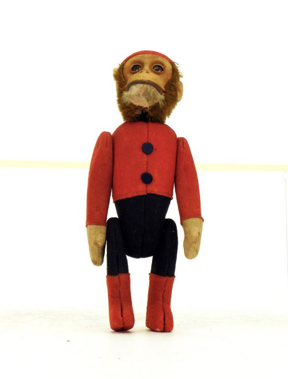 Monkey Nodder - Schuco: Schuco - 1920's - 8.25" Tall. His tail is used to move his head up and down and side to side. Excellent Condition