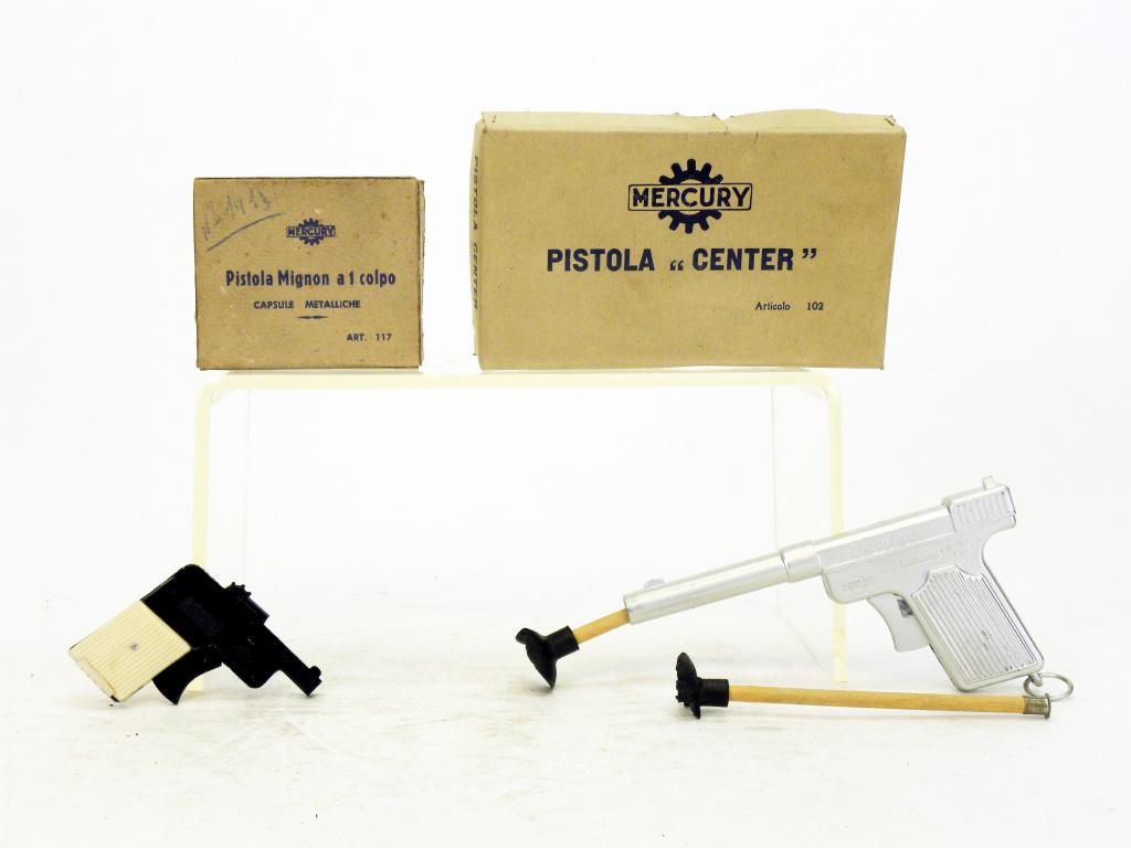 Two Pistols - Mercury: Made by Mercury. Italian - 1960's - 2 1/2" / 6" Long. Pristine with Boxes. The rubber on the darts is dried out.